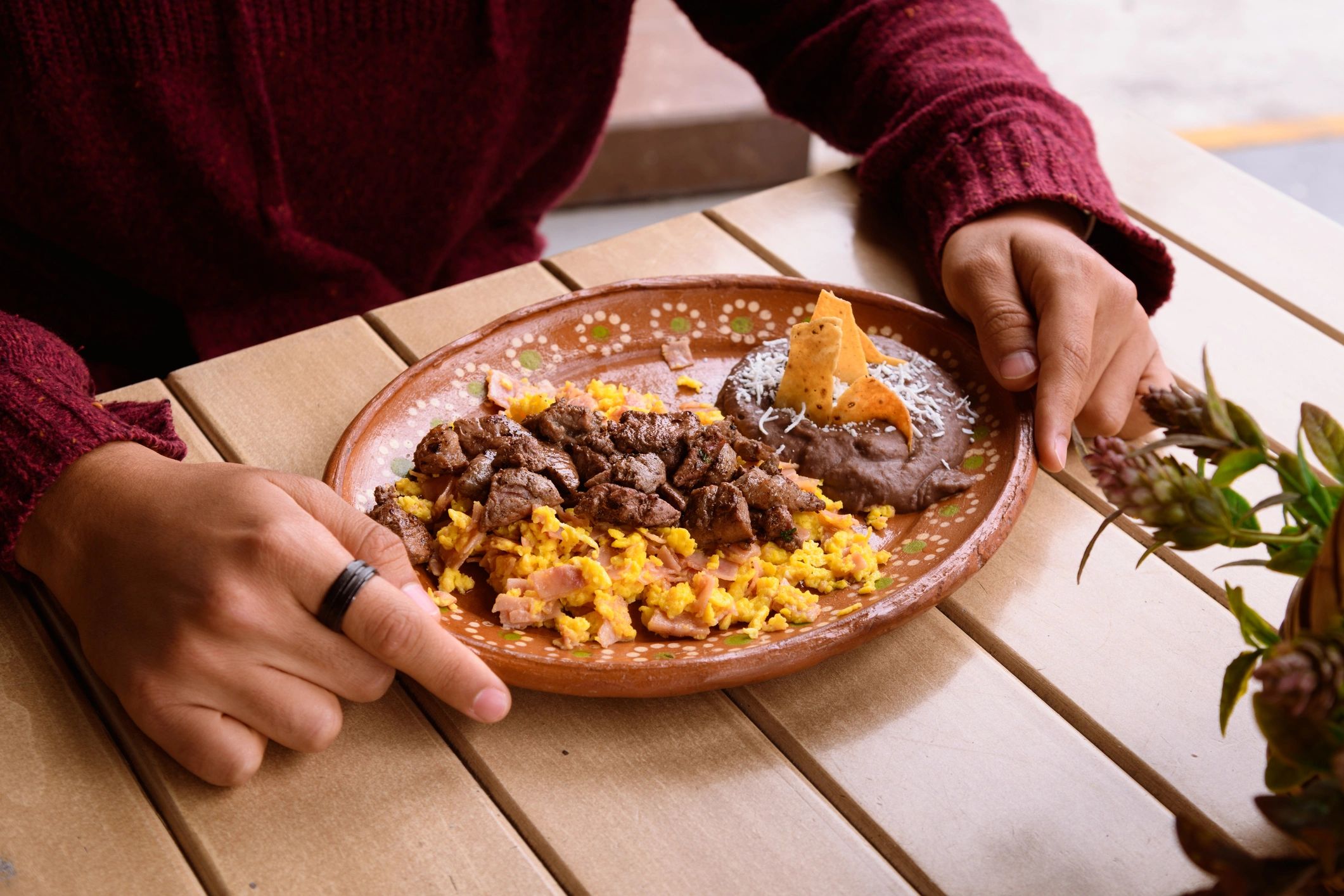 Handmade Mexican food being prepared on a hot griddle