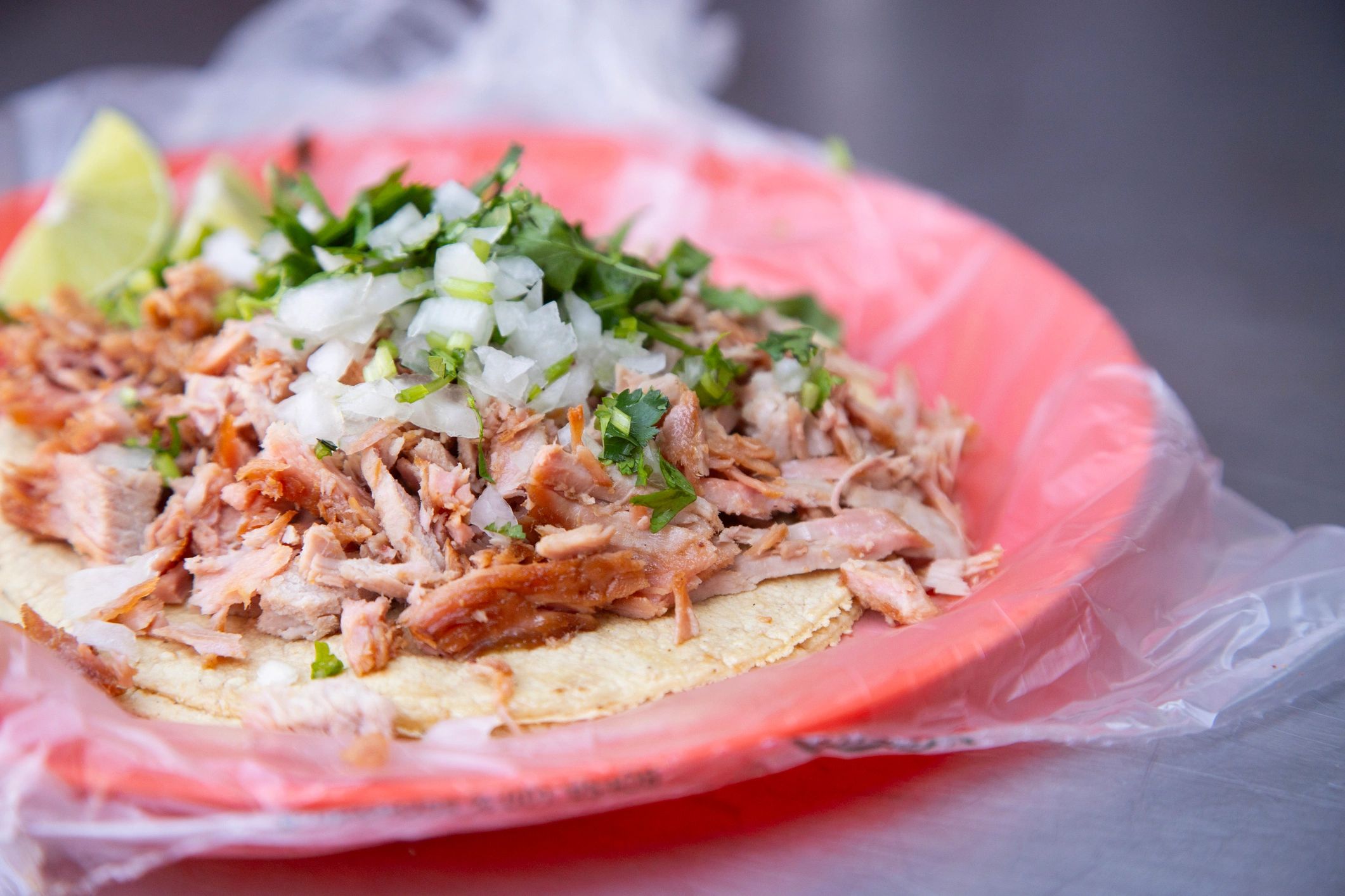 Street food stand serving the famous pork carnitas tacos in Mexico City.
